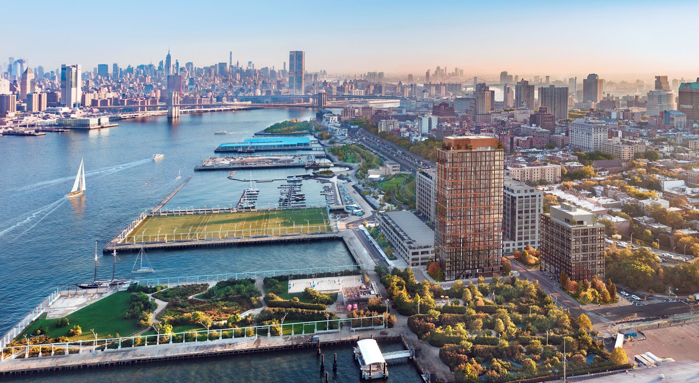 Aerial view of Quay Tower and Brooklyn Bridge Park with lower Manhattan beyond